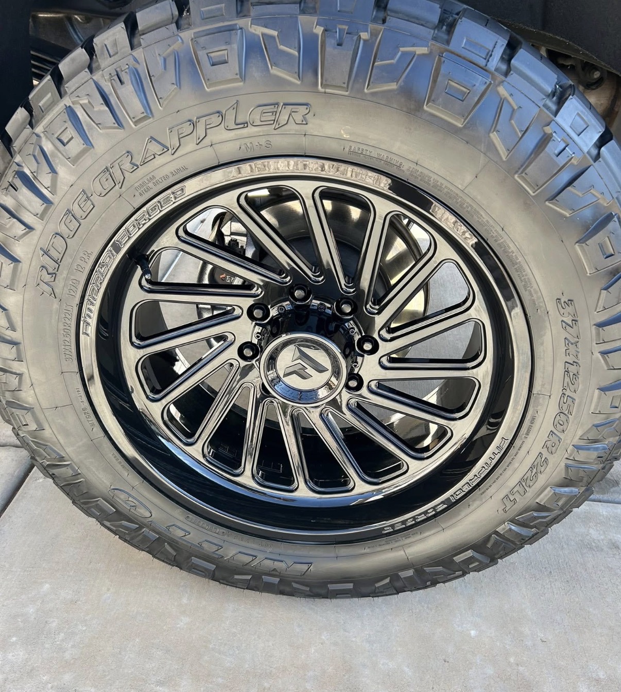 Deep-cleaned wheel and tire close-up