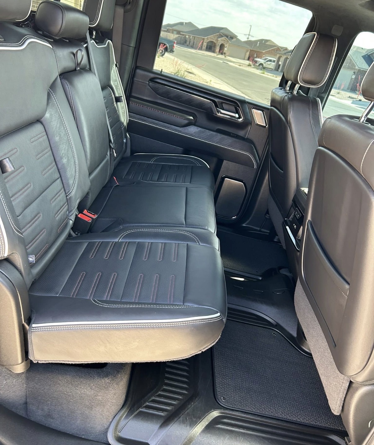 Black leather rear seats restored